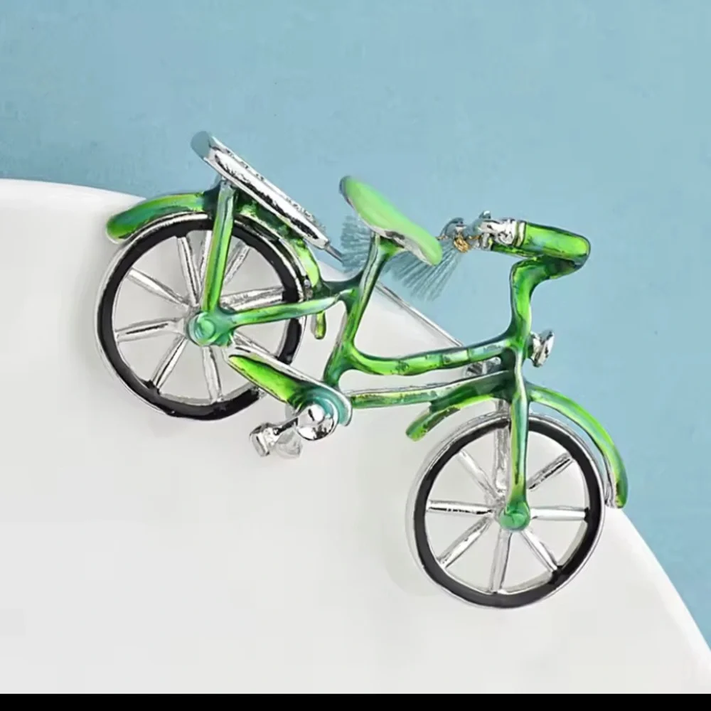 Private Label Green Bicycle Brooch with Blue Tassel Accent